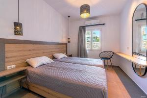 A bed or beds in a room at Katerina View