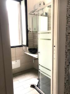 a bathroom with a shower and a sink at Newhouse CRISPI 78 in Bari