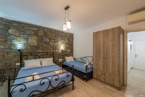 A bed or beds in a room at Katerina View