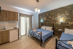 A bed or beds in a room at Katerina View