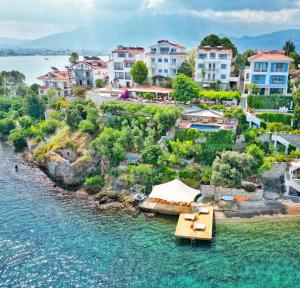 an aerial view of a resort on the water at Ece Hotel Sovalye Island in Fethiye