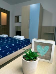 Krevet ili kreveti u jedinici u okviru objekta Sunshine Romance Apartment