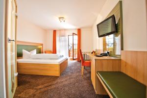 Postel nebo postele na pokoji v ubytování Danner´s Hotel Löwen