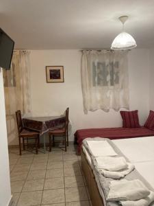 Posteľ alebo postele v izbe v ubytovaní Coastal Apartments Volos Alykes