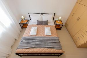 Ένα ή περισσότερα κρεβάτια σε δωμάτιο στο Costos Condos NEW 10A 1 Bedroom