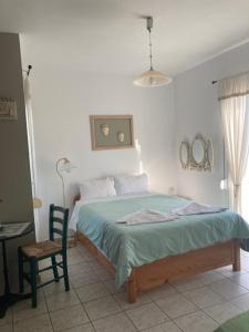 Posteľ alebo postele v izbe v ubytovaní Coastal Apartments Volos Alykes
