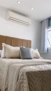 Ένα ή περισσότερα κρεβάτια σε δωμάτιο στο Apartamento no coração do Rio