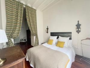 Ein Bett oder Betten in einem Zimmer der Unterkunft Eva Recommends Porvenir Apartment