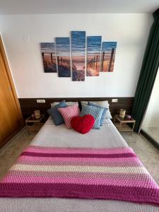 Łóżko lub łóżka w pokoju w obiekcie Apartamento Paraiso Lido