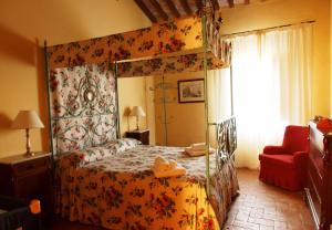 Кровать или кровати в номере Agriturismo La Volta