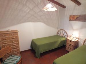 Кровать или кровати в номере Trulli La Ghianda