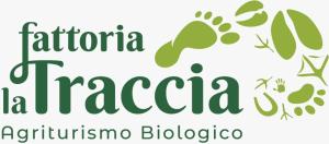 a sign that reads fructinia nicaragua with a plant at Fattoria La Traccia in Fertilia