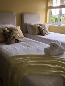 Ліжко або ліжка в номері Bourne House, private modern apartment near Rugby & Lutterworth