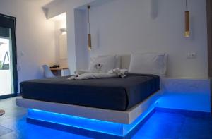 Postelja oz. postelje v sobi nastanitve Sun Springs Suites