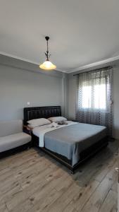 Postel nebo postele na pokoji v ubytování Γιώργος και Εύα