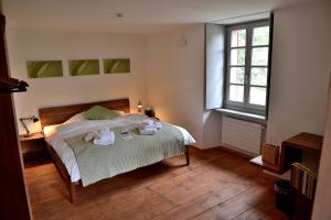 Voodi või voodid majutusasutuse Unique Hotel Fusio toas