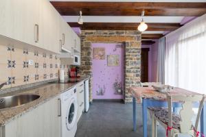 Kuchyň nebo kuchyňský kout v ubytování Casa Dieste Apartamentos Turísticos en Boltaña