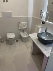 Kúpeľňa v ubytovaní Dante Rooms