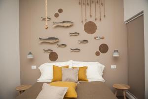Postel nebo postele na pokoji v ubytování NEREA - Apulian Suite and Rooms