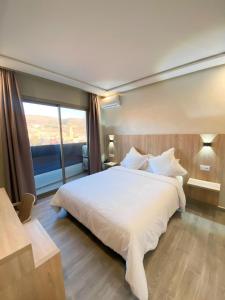 Voodi või voodid majutusasutuse HOTEL CAFE PALAIS SALAM , Beni Mellal toas