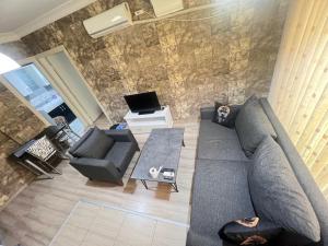 Photo de la galerie de l'établissement kızıl suit house, à Buca 20 autres photos