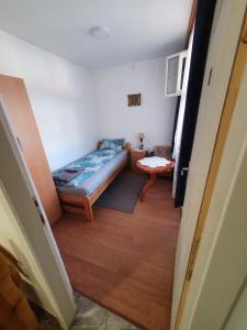 Postel nebo postele na pokoji v ubytování Apartman Tupavica