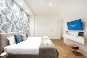 TV a/nebo společenská místnost v ubytování White flat Gallia