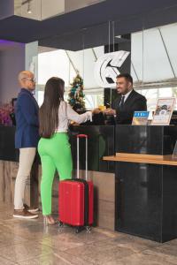 Hóspedes ficando em Golden Tulip Porto Vitória