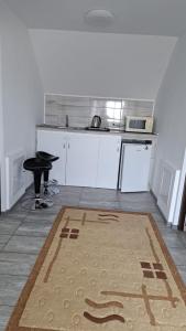 Kuchyň nebo kuchyňský kout v ubytování Casa Gabi