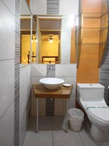Um banheiro em Hotel El Huacachinero