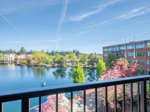 a view of a lake from a balcony at Century Hotel in Tualatin