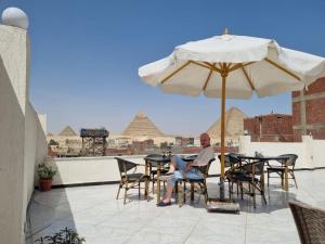 Fotografie z fotogalerie ubytování Eagles Pyramids View v Káhiře