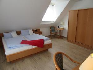 Postel nebo postele na pokoji v ubytování Zum Hanseaten