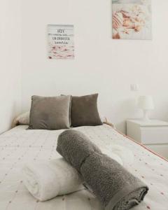 Posteľ alebo postele v izbe v ubytovaní Apartamento Carranque