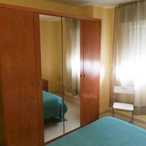 Posteľ alebo postele v izbe v ubytovaní Apartamento Carranque