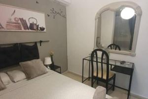 Posteľ alebo postele v izbe v ubytovaní Apartamento Carranque
