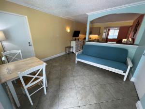 Postel nebo postele na pokoji v ubytování Pelican Pointe Clearwater Beach Hotel