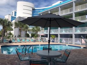 Bazén v ubytování Pelican Pointe Clearwater Beach Hotel nebo v jeho okolí