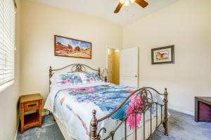a bedroom with a bed and a ceiling fan at Mesquite Vacation Rental - Close to Golf Courses! in Mesquite
