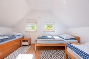 Tempat tidur dalam kamar di Kuća za odmor JASENAK