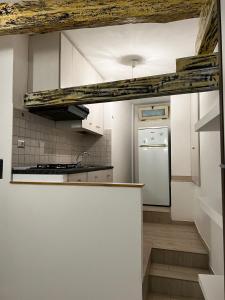 Kuchyň nebo kuchyňský kout v ubytování L Antico Soffitto Tropea