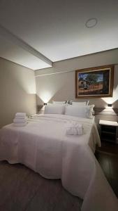 Hotel Dan Inn Uberlandia By Nacional Inn客房内的一张或多张床位