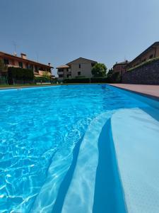 Πισίνα στο ή κοντά στο Private Garden Giardino Privato a Bardolino - House Amorino