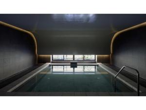 a pool of water in a room with a window at SOKI KANAZAWA - Vacation STAY 40338v in Kanazawa