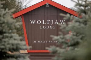 a black and red building with the words wolfpunk lodge at Wolfjaw Lodge in Wilmington