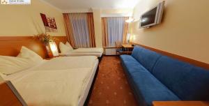 TV a/nebo společenská místnost v ubytování Hotel Evido Salzburg City Center + 27 fotografií