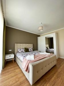 Posteľ alebo postele v izbe v ubytovaní Apartament Cluj