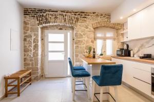 Kuchyň nebo kuchyňský kout v ubytování Apartmani Boras