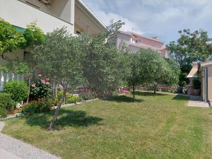 Vonkajšia záhrada v ubytovaní Apartments Vlasici