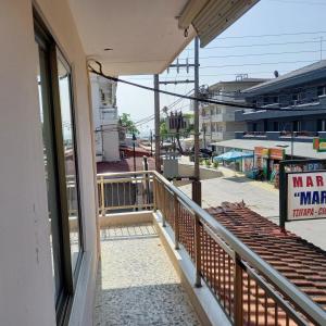 Balkón alebo terasa v ubytovaní ΜΑΡΟΥ ROOMS